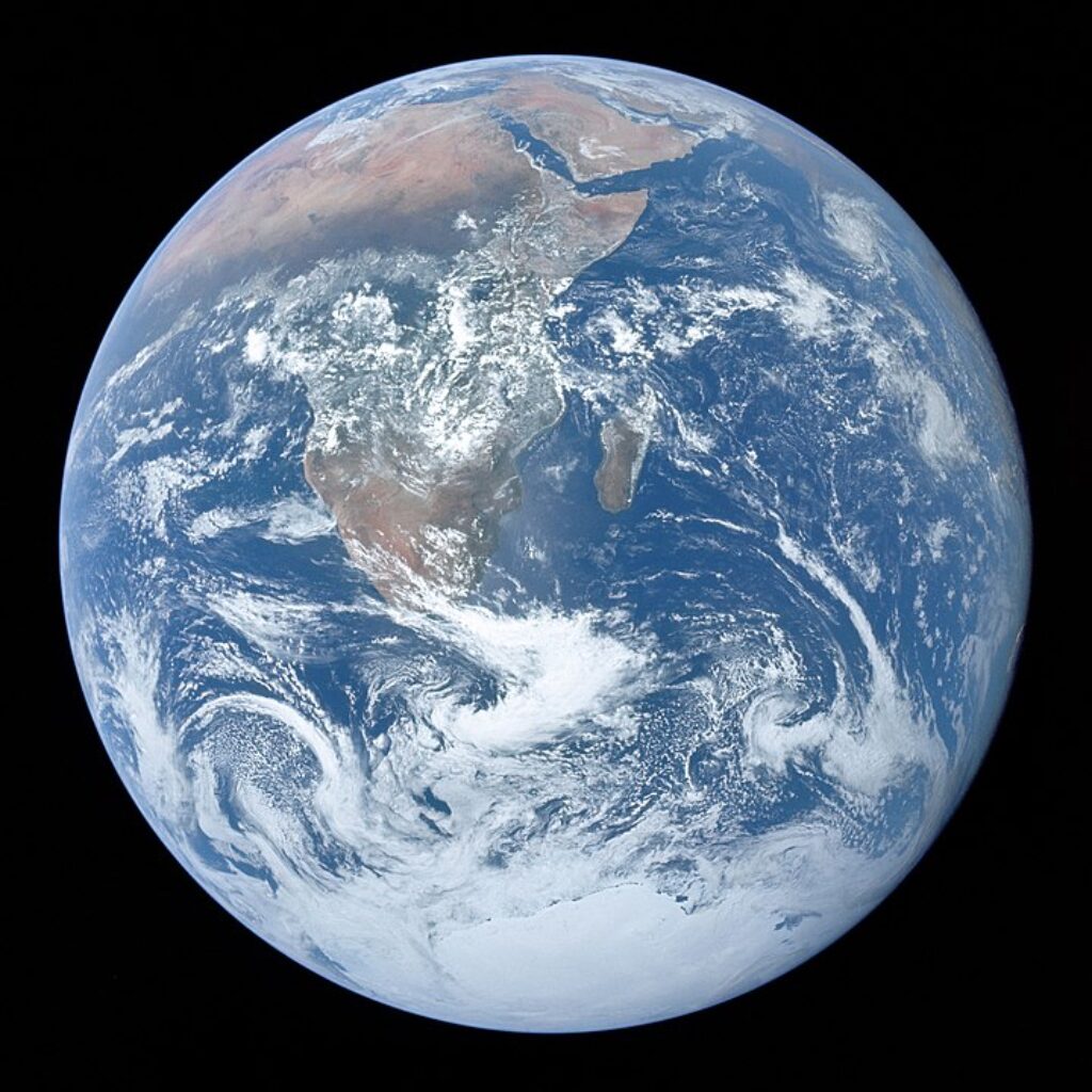 Full disk view of the Earth taken on December 7, 1972, by the crew of the Apollo 17 spacecraft en route to the Moon at a distance of about 29,000 kilometres (18,000 mi). It shows Africa, Antarctica, and the Arabian Peninsula.